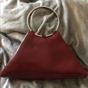 Wilsons Leather Hoop Handed Purse.